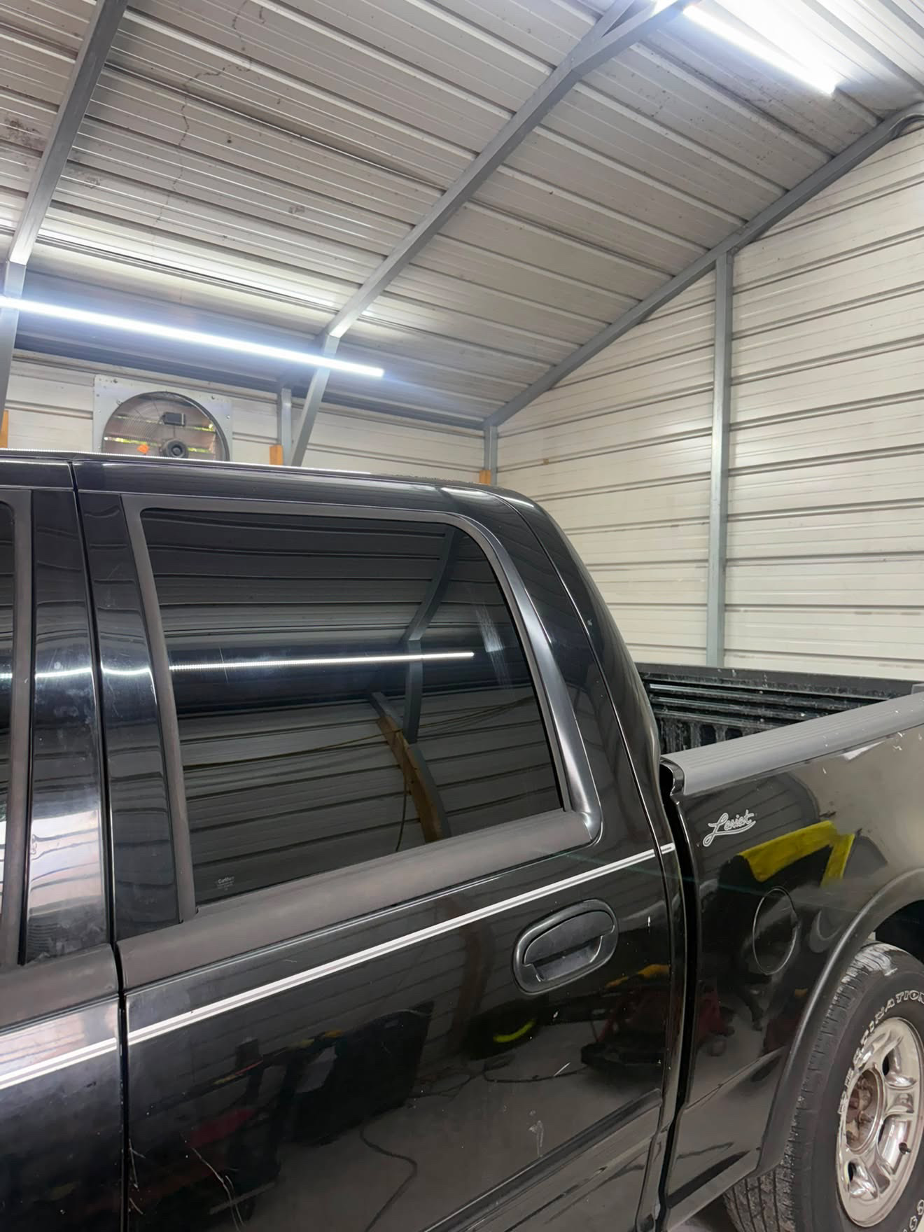 Black Ford F-150 Lariat tinted