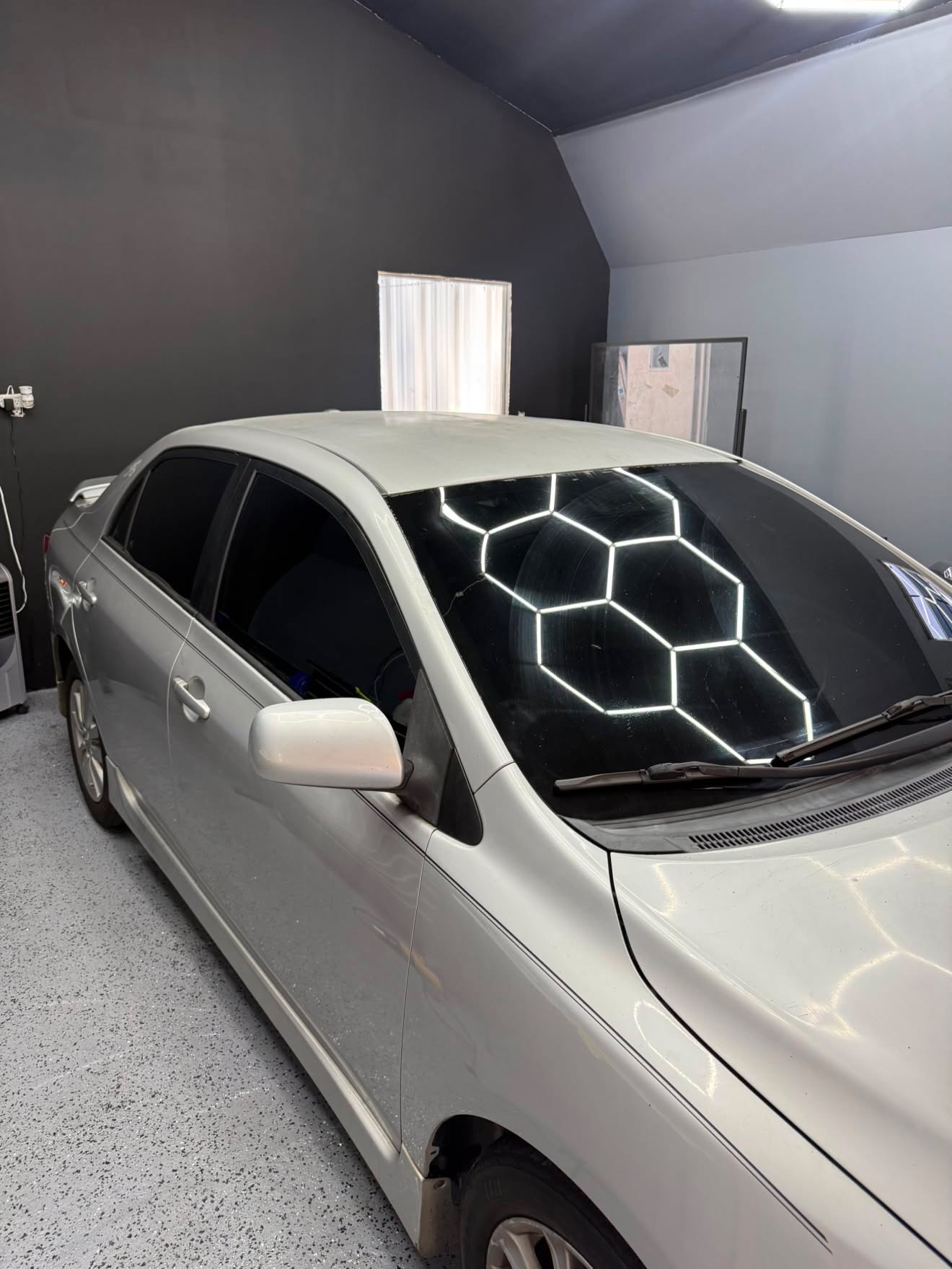 White Toyota with premium tint