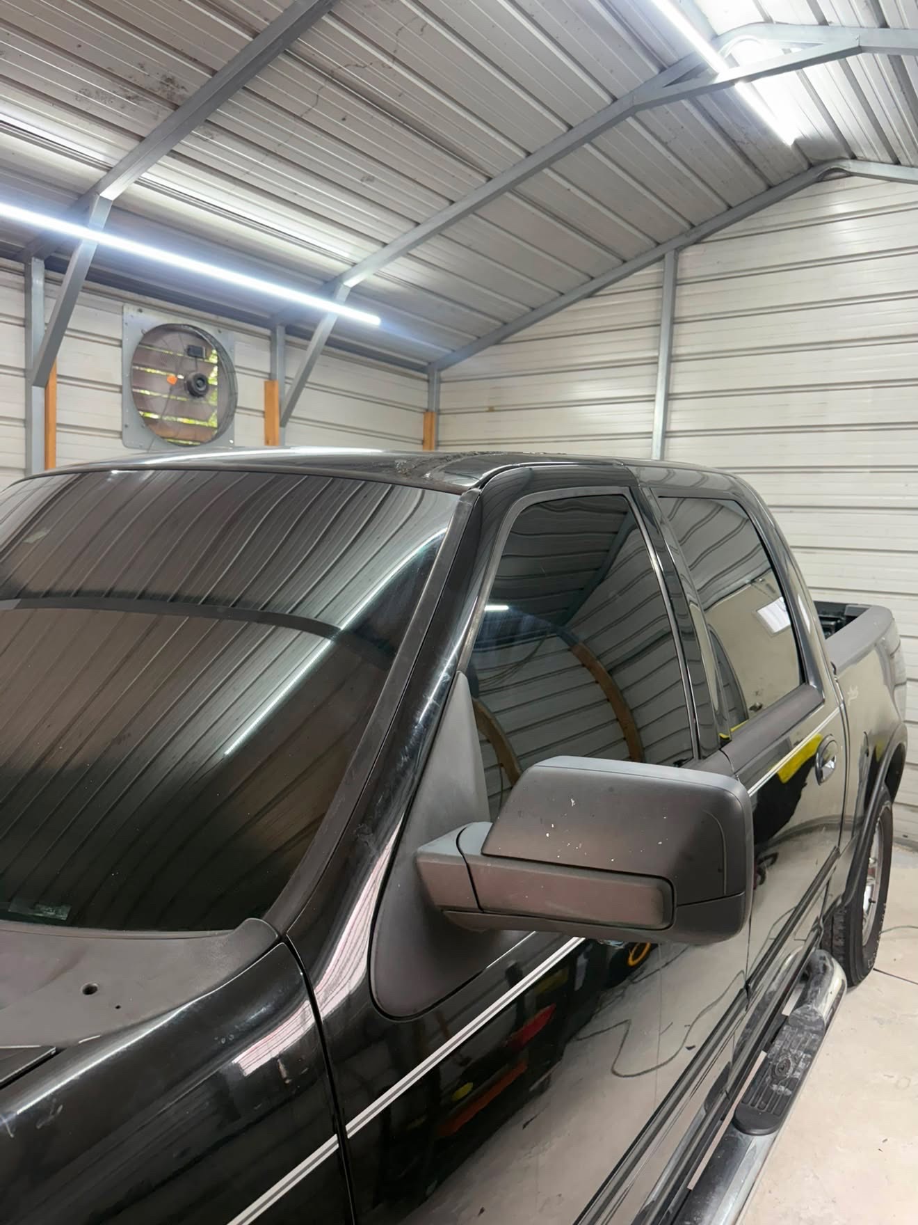 Black F-150 side profile tinted